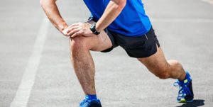 Male Runner Stretching