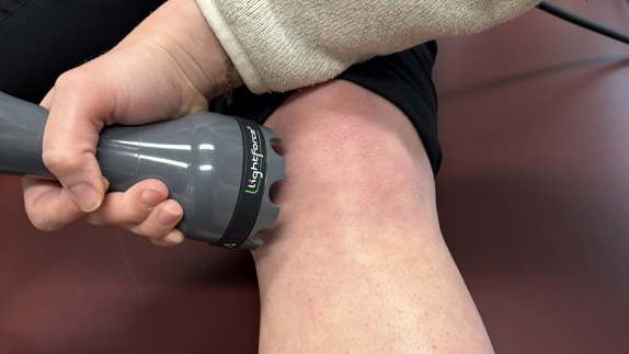 Laser Therapy on patient knee